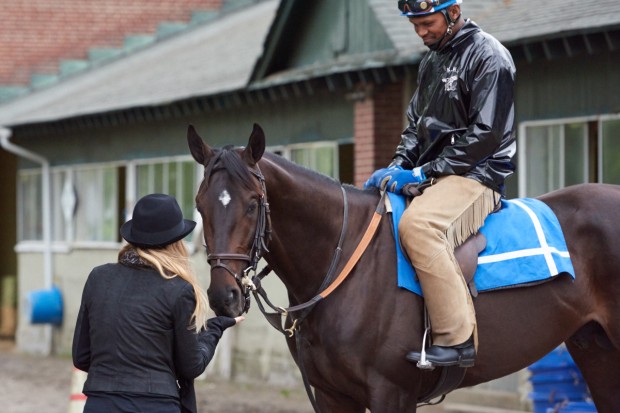 Coz gets a treat from Ann last year at Belmont. Photo by Kyle Acebo.