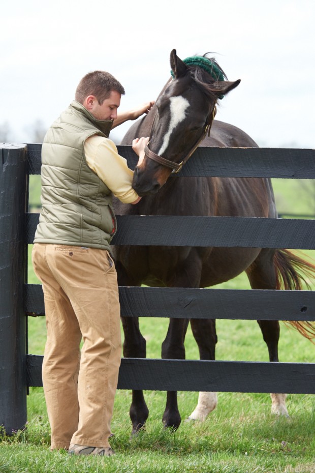 Zenyatta enjoys a scratch from Broodmare Manager Charles Campbell. Photo by Kyle Acebo.