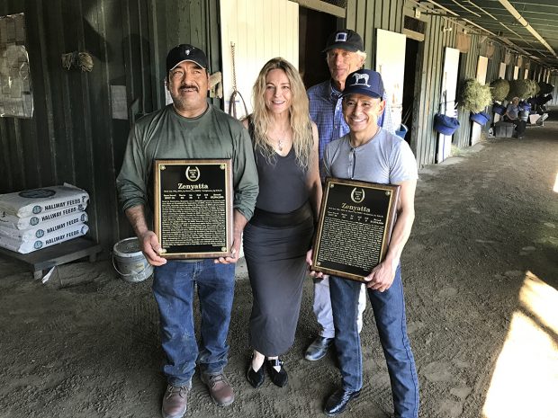 Mario, Ann, John and Mike pose with Zenyatta's Hall of Fame plaque.