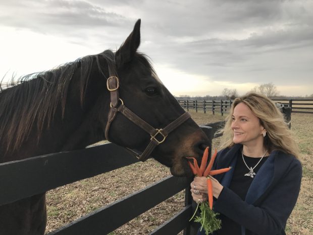 Ann brings bundles of sweet carrots. Photo courtesy of Team Zenyatta